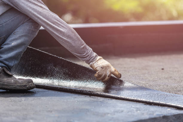 Professional Interior Drainage System technician working in Holbrook, NY